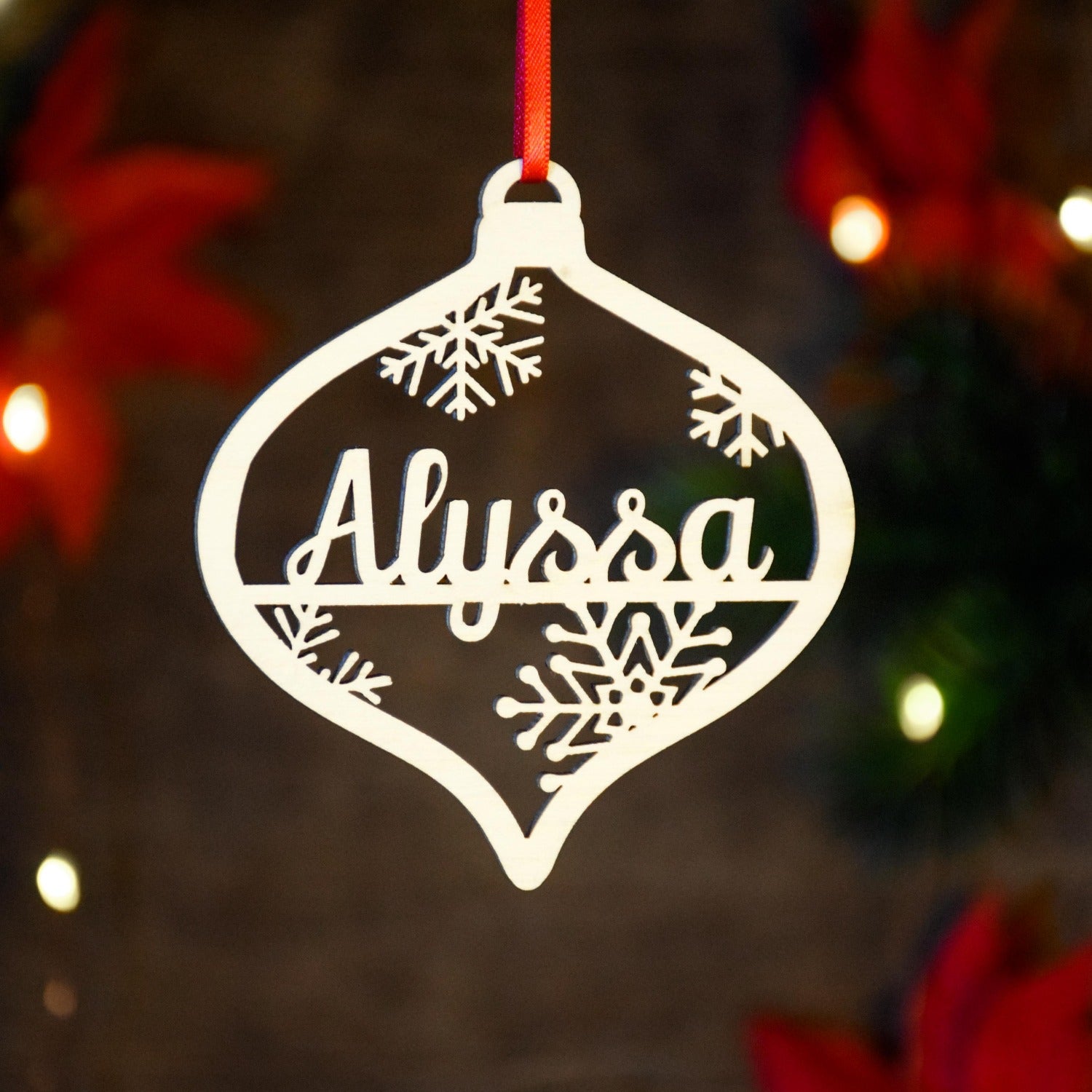 Custom Christmas ornaments made from Baltic birch and personalized with a custom name or date. Great gifts for children or grandchildren.