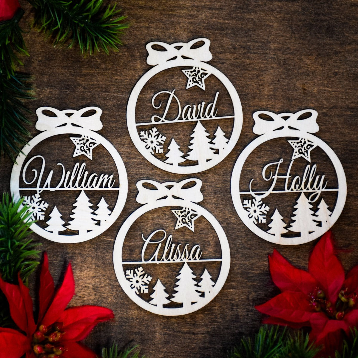 Personalized round Christmas Holiday ornaments crafted from baltic birch and delicately cut with trees, snowflakes and star shapes.