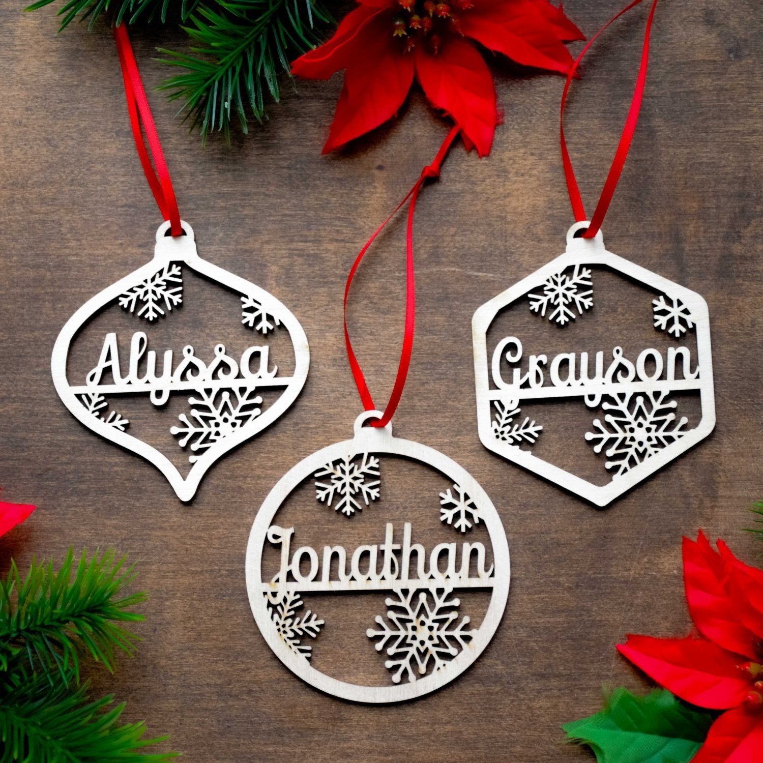 Personalized Christmas ornaments custom made from Baltic birch and personalized with a custom name or date. Great gifts for children or grandchildren.