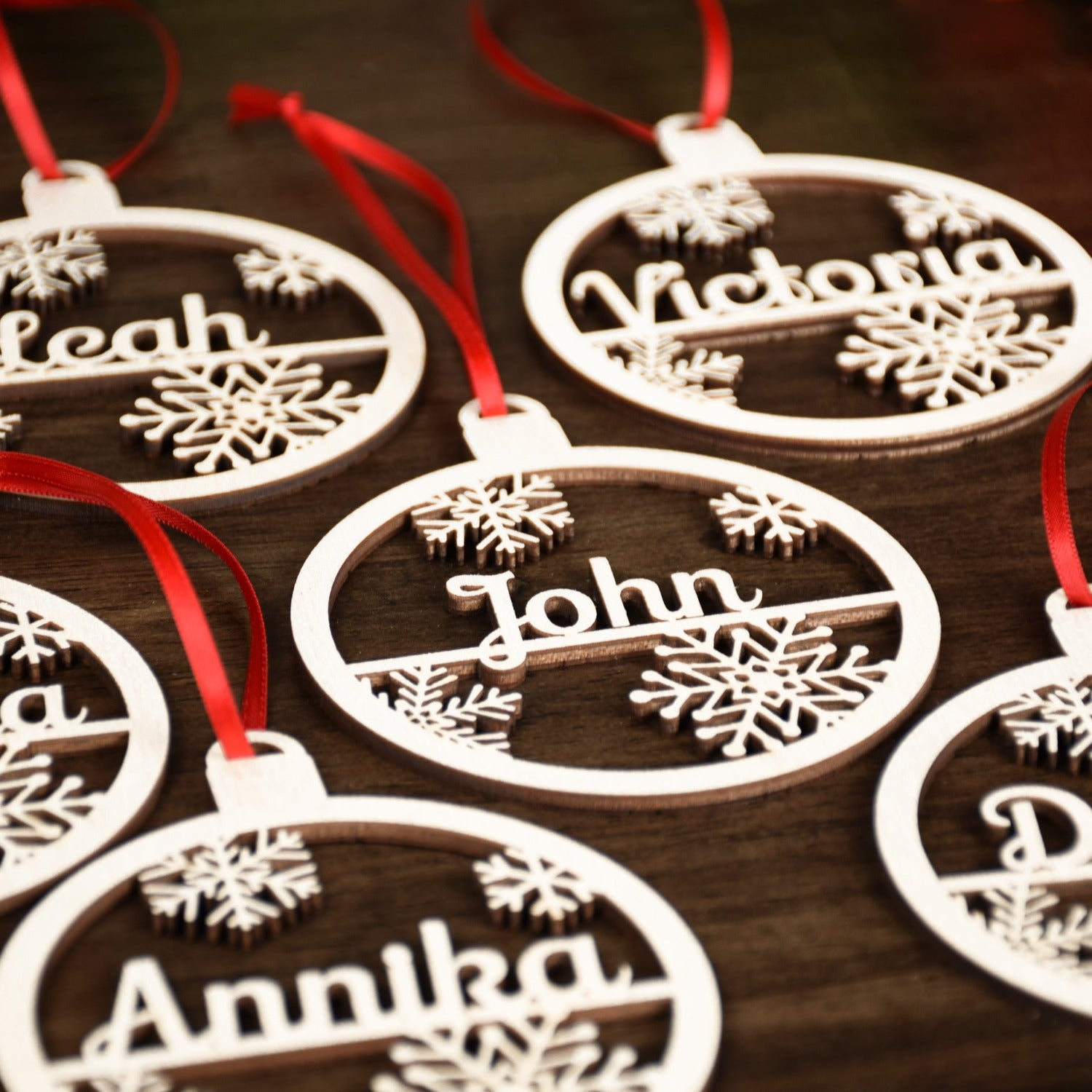 Ornaments cut in 3D and personalized with a name or date.