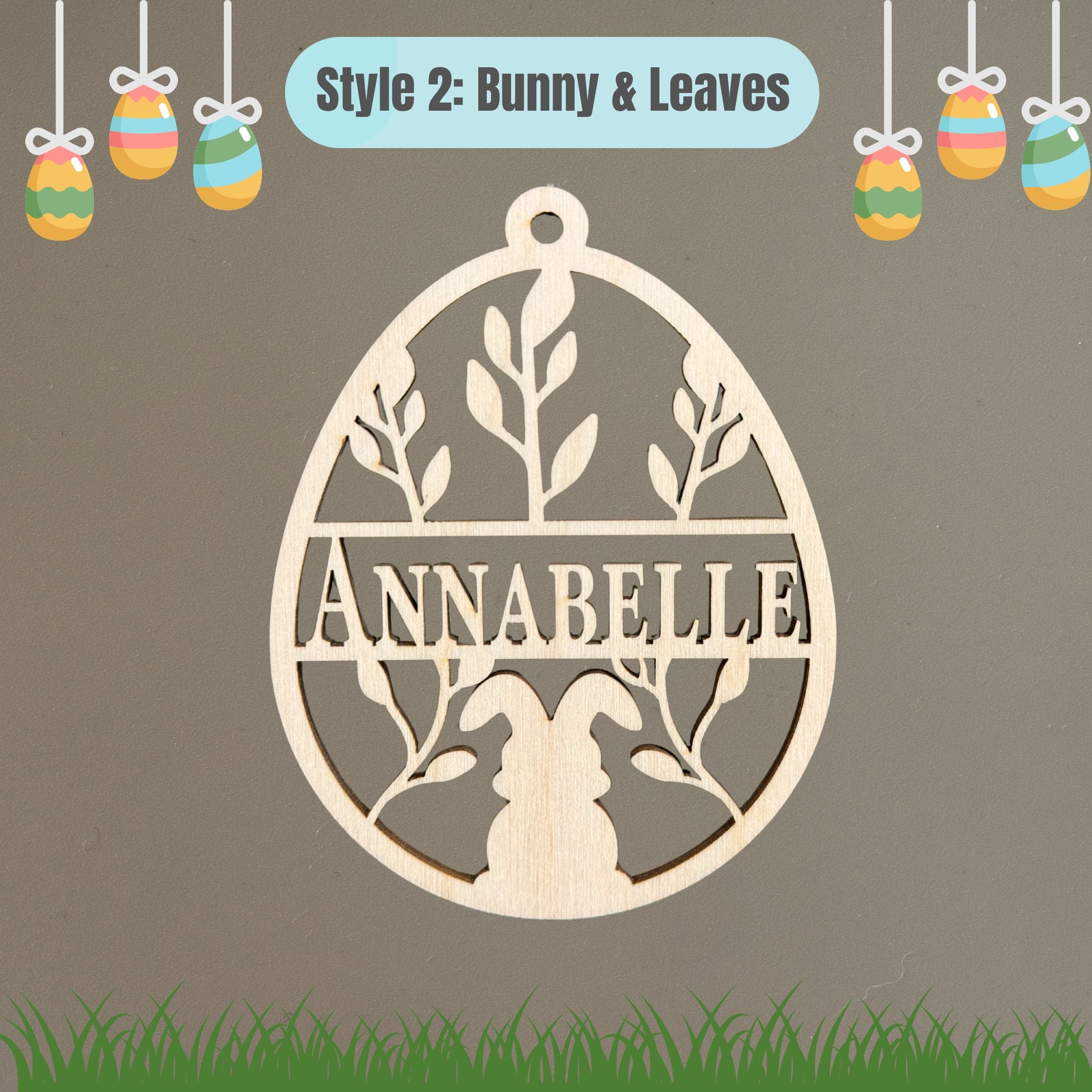 Easter egg ornament with bunny and leaf shapes laser cut from baltic birch and handmade in alaska.