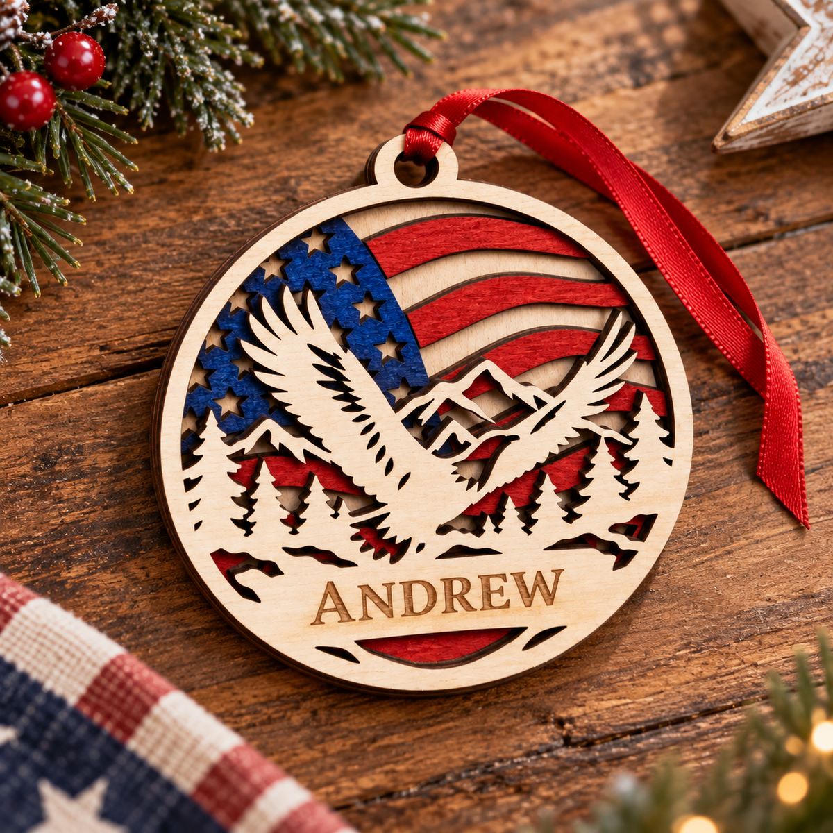 Personalized round wooden Christmas ornament with a laser-cut bald eagle over mountains and a U.S.