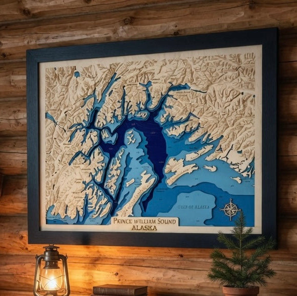 Framed topographic map of Prince William Sound, Alaska on a wooden wall.
