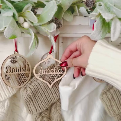 Personalized christmas ornaments for use as stocking tags gift tags or name place holders