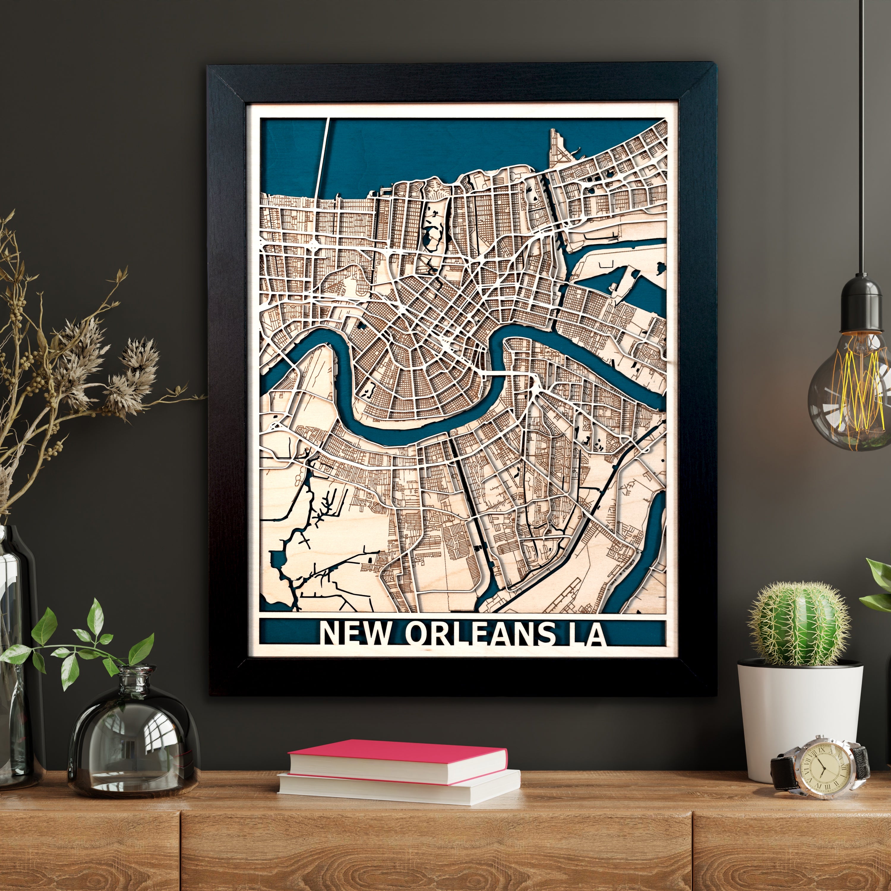 3D Laser Cut City map.  This is a custom city map and this image shows the city of new orleans.  The waterways are cut out and painted blue and the city streets are cut in 3D from premium baltic birch wood.